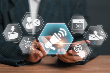 Businessman Using Digital Interface with Call to Action Icons for Marketing and Communication Strategies