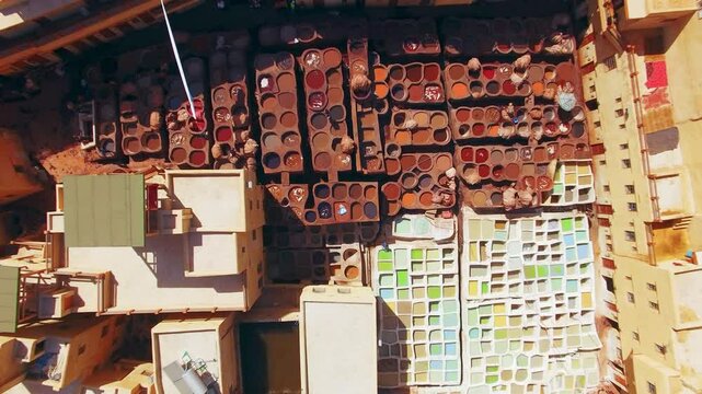 The Chouara Tannery in Fez, Morocco, seen from above, beautifully displays the colorful dyeing vats and intricate designs, showcasing the local craftsmanship and vibrant culture of the area