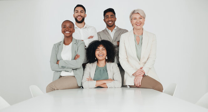 Happy, business people portrait of group by desk for company, commitment or collaboration. Smile, employees and diversity at corporate law firm for legal support, teamwork or confidence in solidarity