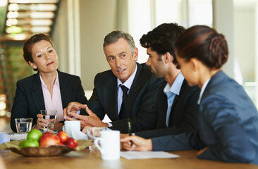 Business people, group and meeting for feedback, planning and idea with review, office and...