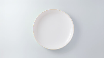 Fototapeta premium Empty white plate with white background, minimalistic design and clean space