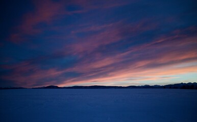 Colorful Sunset over Snowy Landscape