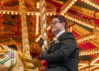 Man in Suit Rides Carousel Horse