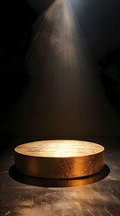 Golden round podium, illuminated by spotlights above