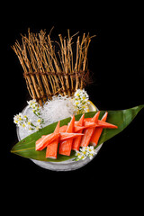 Crab stick sashimi beautifully arranged into a ready-to-eat set. © Kamol