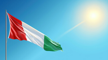 Fototapeta premium Vibrant Italian flag waving in the wind under a clear blue sky, perfect for Republic Day celebrations.