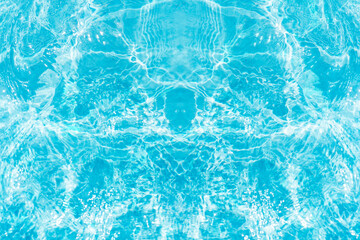 Blue water with ripples on the surface. Defocus blurred transparent blue colored clear calm water surface texture with splashes and bubbles. Water waves with shining pattern texture background.