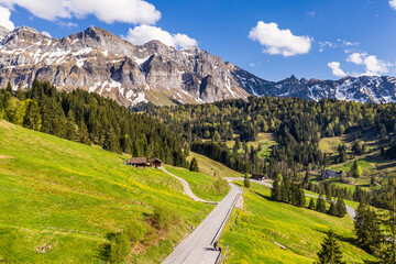 Appenzell, Switzerland: Aerial drone view of the road leading to the Santis mountain in the alps in Canton Appenzell in eastern Switzerland in summer