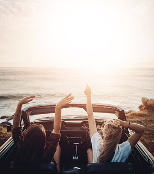 Friends, woman and sunset in car at beach with freedom, scenery and travel adventure with mockup space. Road trip, people and convertible vehicle on coast at ocean for sightseeing and sunrise view