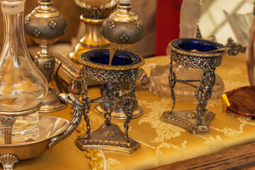 Trinkets at antique flea market in Arezzo Italy