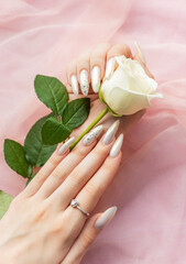 Female Hands with beautiful pearl manicure
