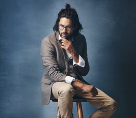 Studio, man and thinking with glasses, serious and confident in mockup, fashion or professional in...