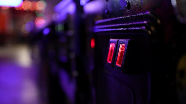 Arcade with pinball machines focused on coin door 4k
