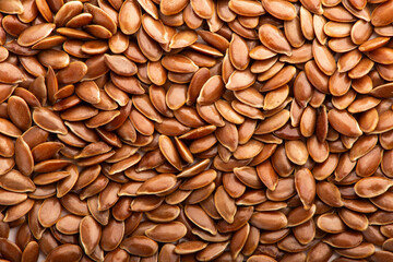 Brown flax seeds background texture