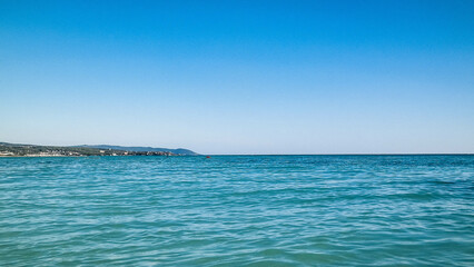 Blue water of Tyrrhenian sea in Vada, Tuscany, Italy.