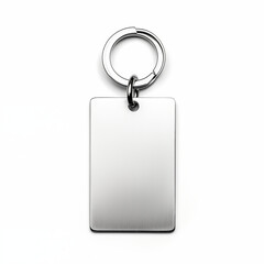 Fototapeta premium Silver Metal Keychain With Blank Rectangle Tag On White Background, Minimalist Style