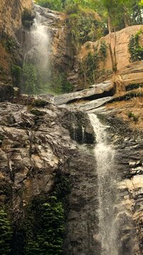 Waterfall 4K Cinematic Slowmotion Natural Calm Relaxing Landscape Scene Vertical Footage, Huai Tueng Thao Thailand.