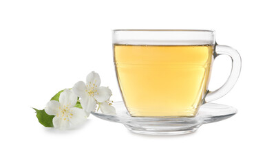 Aromatic jasmine tea in glass cup and flowers isolated on white