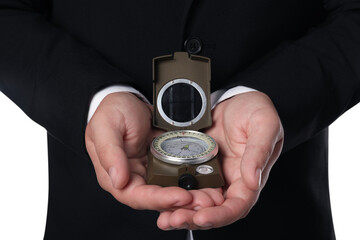 Man holding compass on white background, closeup