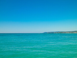 Blue water of Tyrrhenian sea in Vada, Tuscany, Italy.