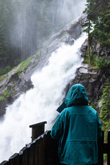 Fototapeta premium Adventurous Hiker on the Path to Krimml Waterfall, Austria