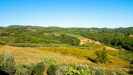 Hills, fields and meadows - typical views of Tuscany, Italy.