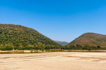View of a magnificent sandy Brahmani River on the lap of the hills