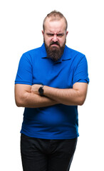 Obraz premium Young caucasian hipster man wearing blue shirt over isolated background skeptic and nervous, disapproving expression on face with crossed arms. Negative person.