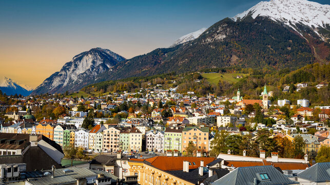 Panoramic view of sunset scene at Innsbruck cityscape, colorful historic buildings in Innsbruck, Austria