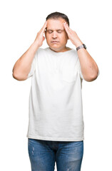 Middle age arab man wearig white t-shirt over isolated background with hand on head for pain in head because stress. Suffering migraine.