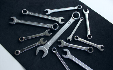 Metallic color spanners from one kit on black anti slip sheet 