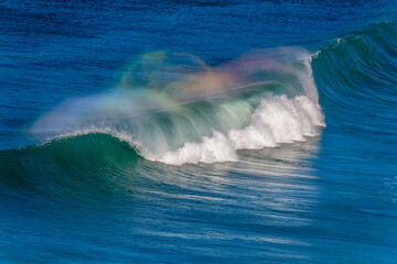 Sea Water Rainbow and Wave at Whale Beach