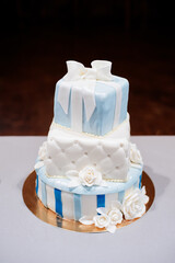 Big wedding cake decorated as gift boxes