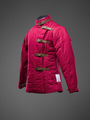 Historical fashion. Medieval knight cloth. Padded jacket gambeson.
