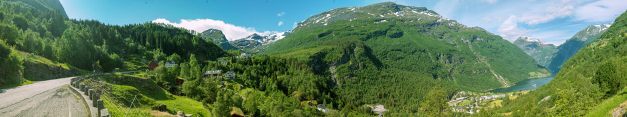 Panoramic mountain view on a sunny day. Beautiful nature of Norway. Horizontal banner