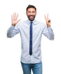 Adult hispanic business man over isolated background showing and pointing up with fingers number seven while smiling confident and happy.