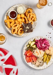 Assorted Beer Snacks and Pickled Vegetables with Vodka