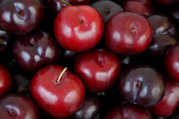 Ripe cherry plums background	