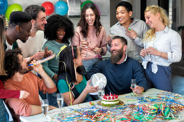 young woman bithday getting pleasant gift from friends