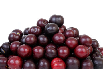 Many cherry plums isolated on white background