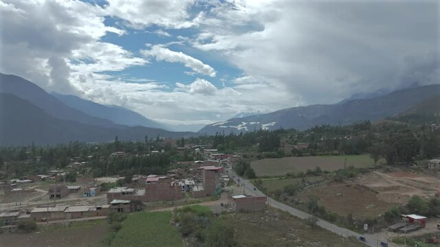 Aerial view of the town of Caraz with mountains background
