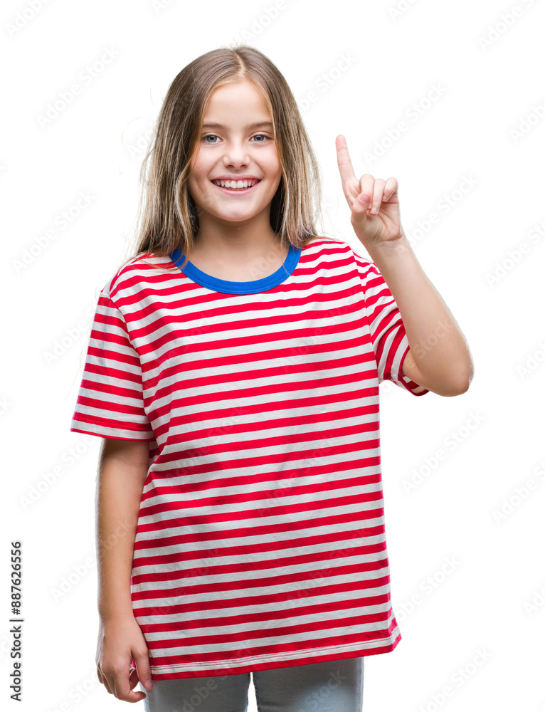 Wall mural Young beautiful girl over isolated background showing and pointing up with finger number one while smiling confident and happy.