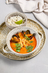 Tom Yum Seafood Soup with Rice - Spicy Thai Cuisine
