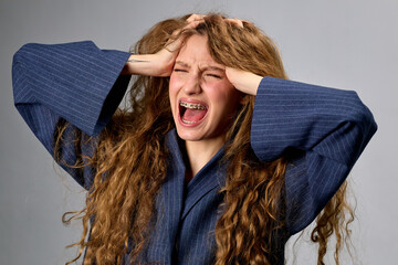 Stressed Woman With Hands on Head