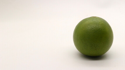 Orange fruit from Indonesia with a white background