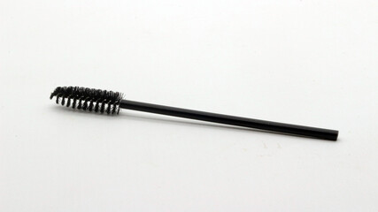 Black eyelash comb