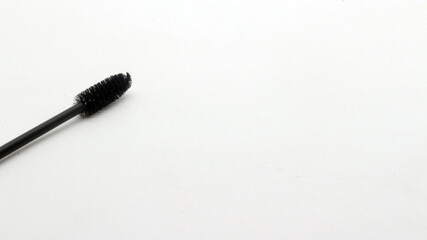 Black eyelash comb