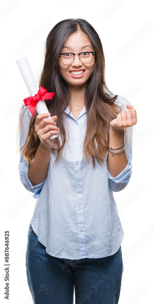 Sticker Young asian woman holding degree over isolated background screaming proud and celebrating victory and success very excited, cheering emotion