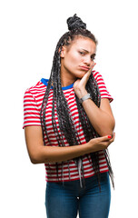 Young braided hair african american girl over isolated background thinking looking tired and bored with depression problems with crossed arms.