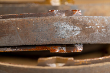 an old rusty brake disc from the car's brake system